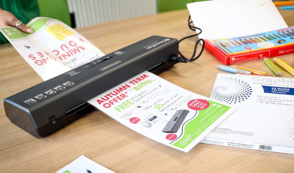 Laminating a sheet of paper with A3 Swordfish Laminator